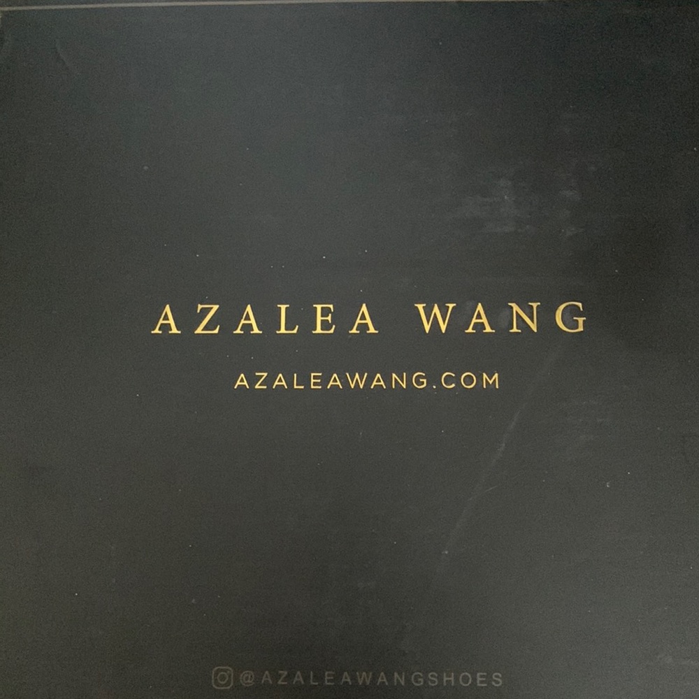 Thigh heeled boots, all black with silver rhinestones on heel and bottom.